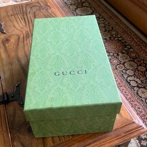 Authentic Gucci shoe box, with ribbons, paper and receipt card.
